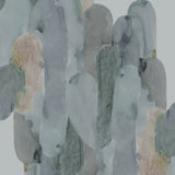 Detail of wallpaper in watercolor elongated pill pattern in moody blues and taupe on a white field.