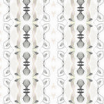 Detail of wallpaper in a watercolor ikat stripe print in shades of cream, pink and gray on a white field.