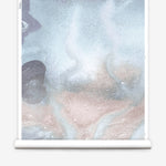Mural wallpaper roll in an abstract textural watercolor design in blue with taupe. 