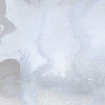 Mural wallpaper detail in an abstract textural watercolor design in pale grey blue. 