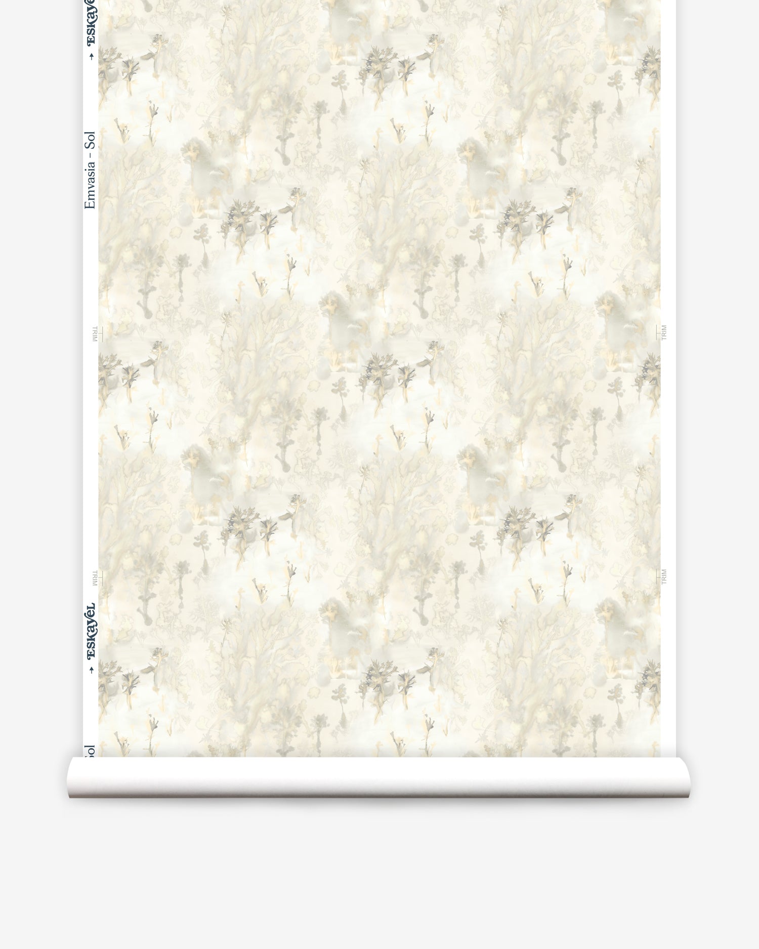 Wallpaper roll in a painterly tree print in gray and tan on a white field.