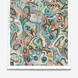 Wallpaper roll in abstract brushstroke design in shades of teal, rust brown and black accents. 