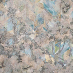 Detail of wallpaper in a painterly tree print in cream, gray and turquoise.