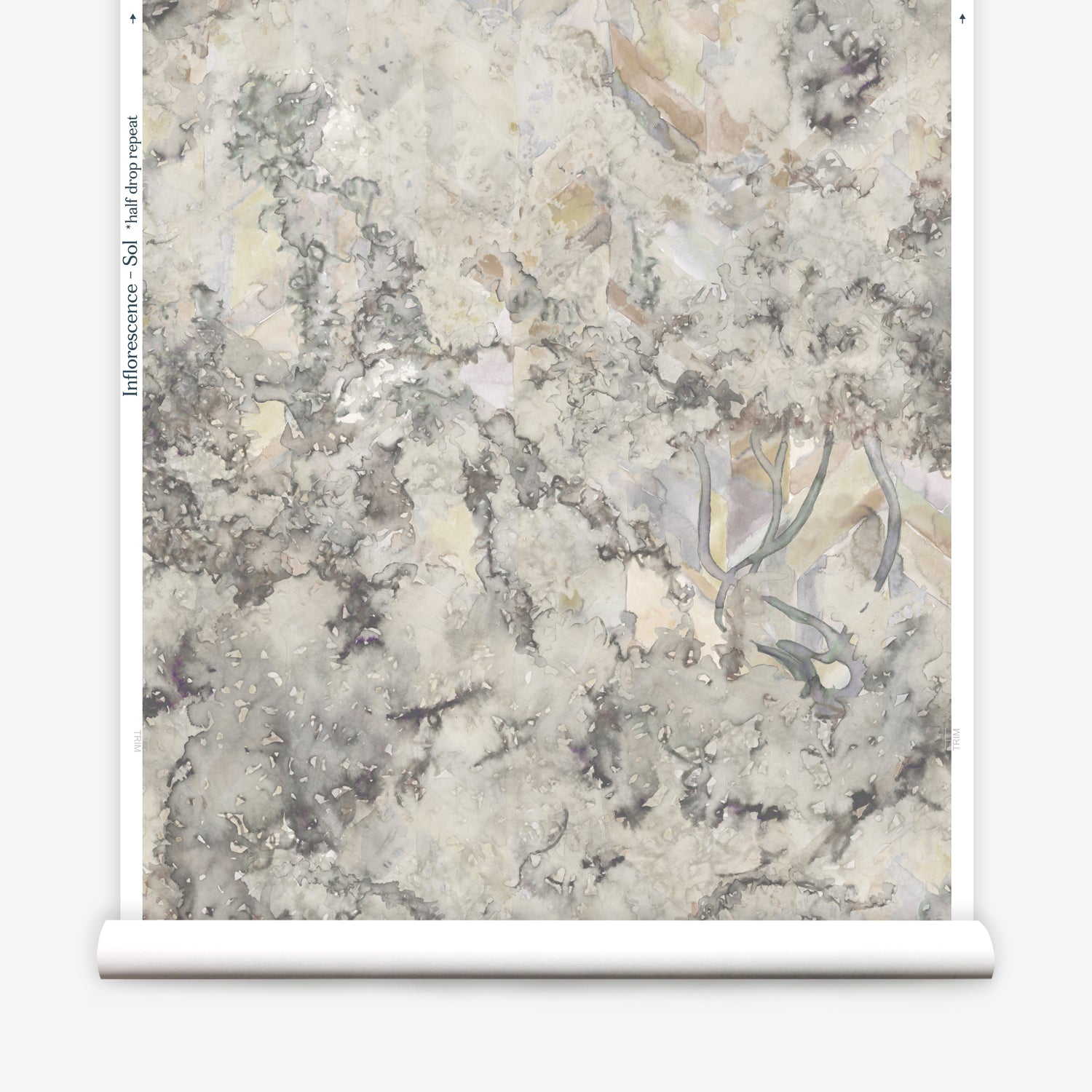 Wallpapper roll in a painterly tree print in gray, brown and purple.