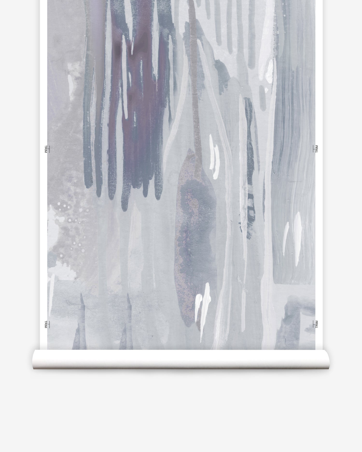 Wallpaper mural roll in a watercolor paint print in shades of purple and gray on a cream field.