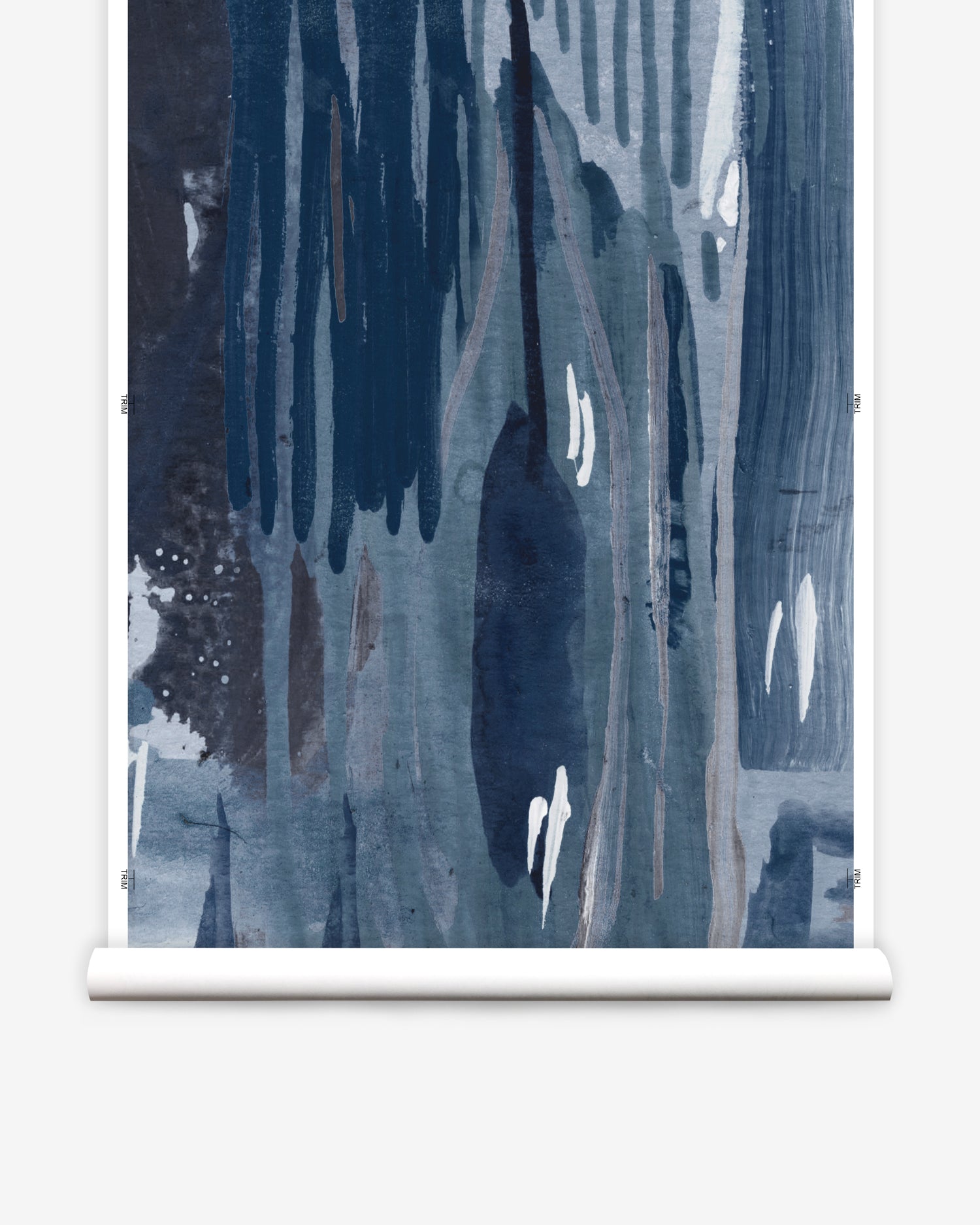 Wallpaper mural roll in a watercolor paint print in shades of black, purple and blue on a gray field.
