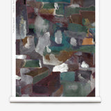 Wallpaper roll in a textural paint blotch print in shades of purple, turquoise and green on a gray field.