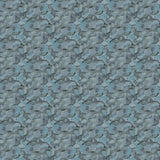 Wallpaper detail in an undulating abstract watercolor motif in shades of steel blue and charcoal. 