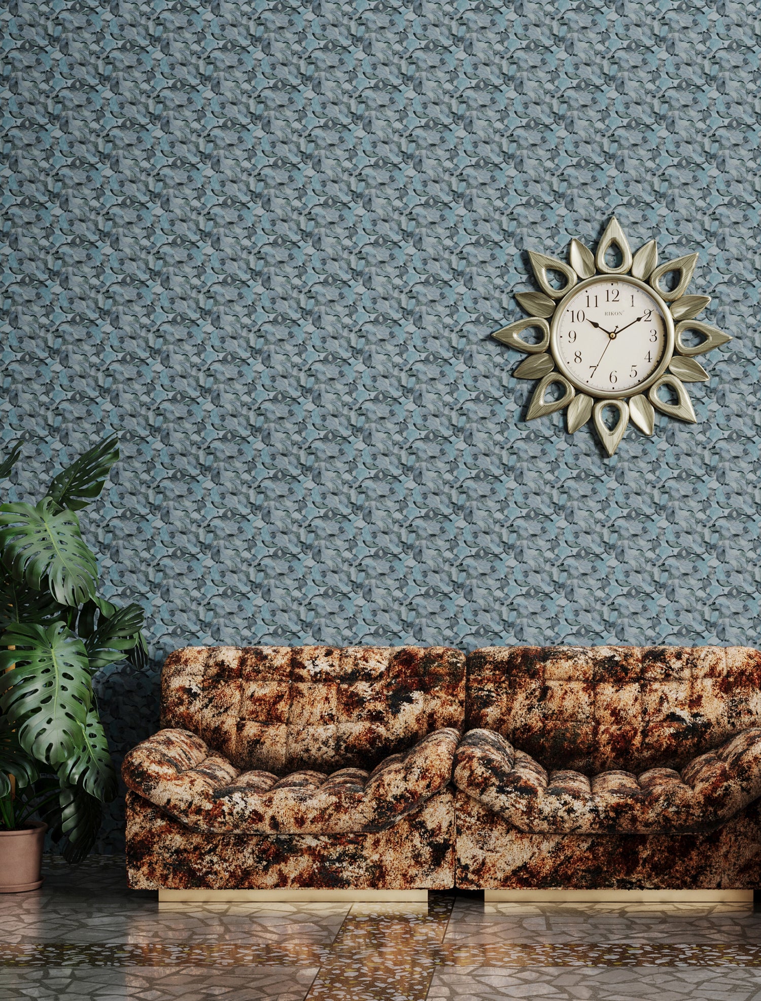 Retro couch in mottled brown with a potted plant against wallpaper in  an undulating abstract watercolor motif in shades of steel blue and charcoal. 
