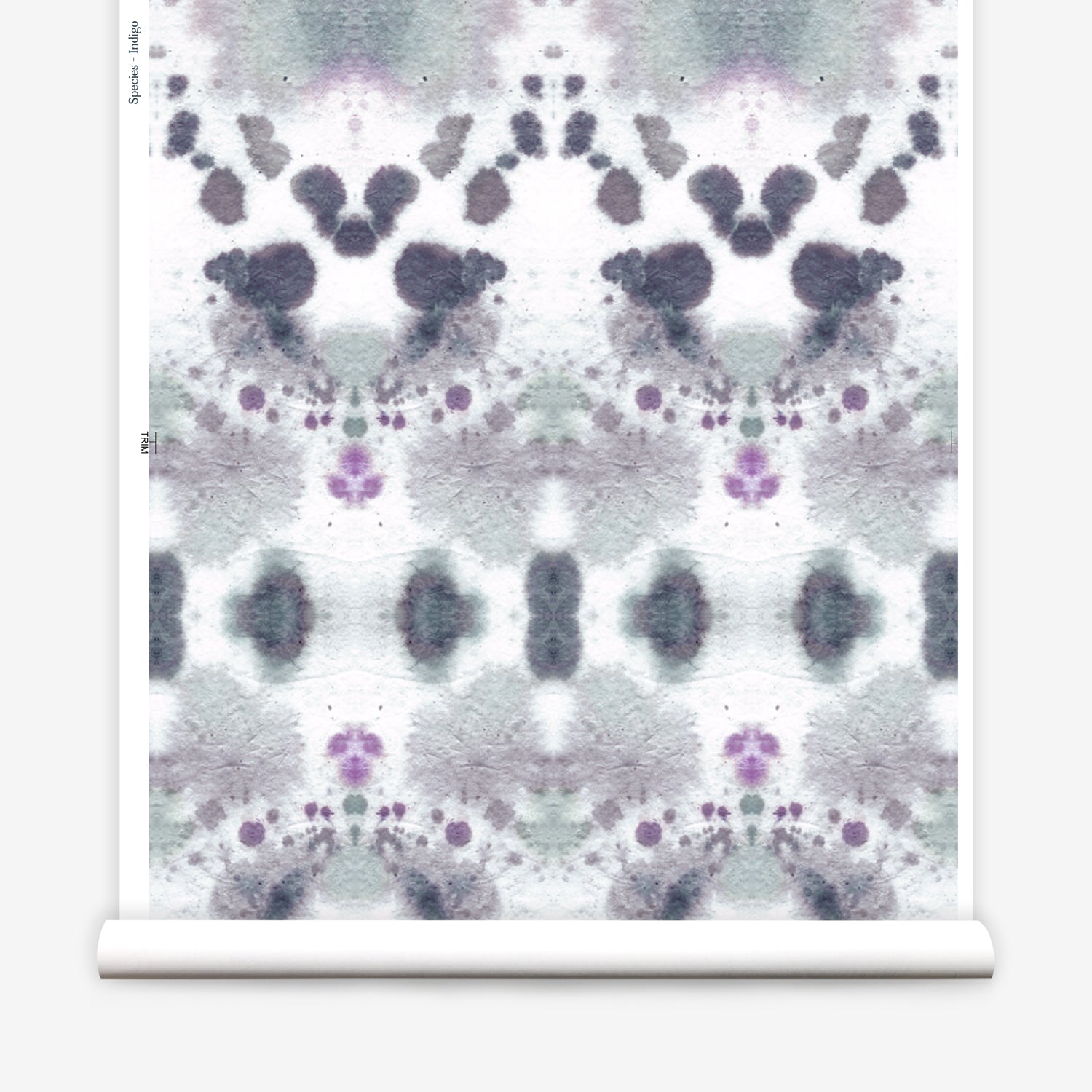 Wallpaper roll in a watercolor inkblot print in shades of purple and gray on a cream field.