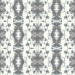 Detail of wallpaper in a painterly gometric stripe in gray and blue on a cream field.