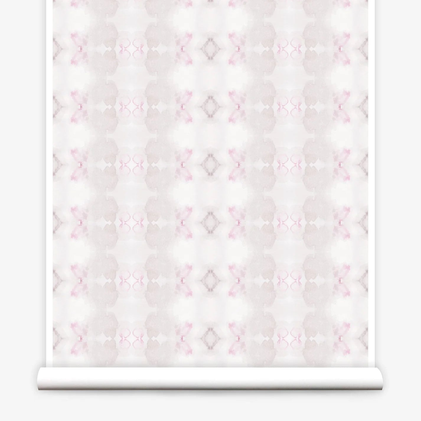 Partially unrolled wallpaper yardage in a striped ink blot print in shades of tan and pink on a cream field.