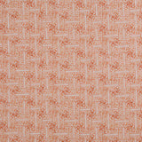 Detail of fabric in a geometric grid pattern in coral on a cream field.