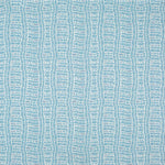 Detail of fabric in a playful curvy grid print in blue on a white field.