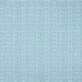 Detail of fabric in a playful curvy grid print in blue on a white field.