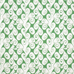 Detail of fabric in a playful abstract shape print in white on a light green field.