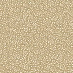 Small leaf design in white on a warm tan background