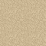 Small leaf design in white on a warm tan background