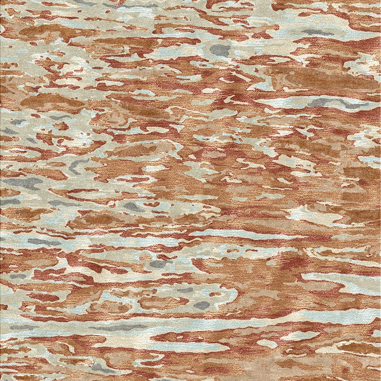 Handknotted rug in an abstract watercolor design in shades of orange, cream and grey.