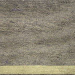 Handknotted rug in a  pewter silk rib with gold metallic stripes and border. 