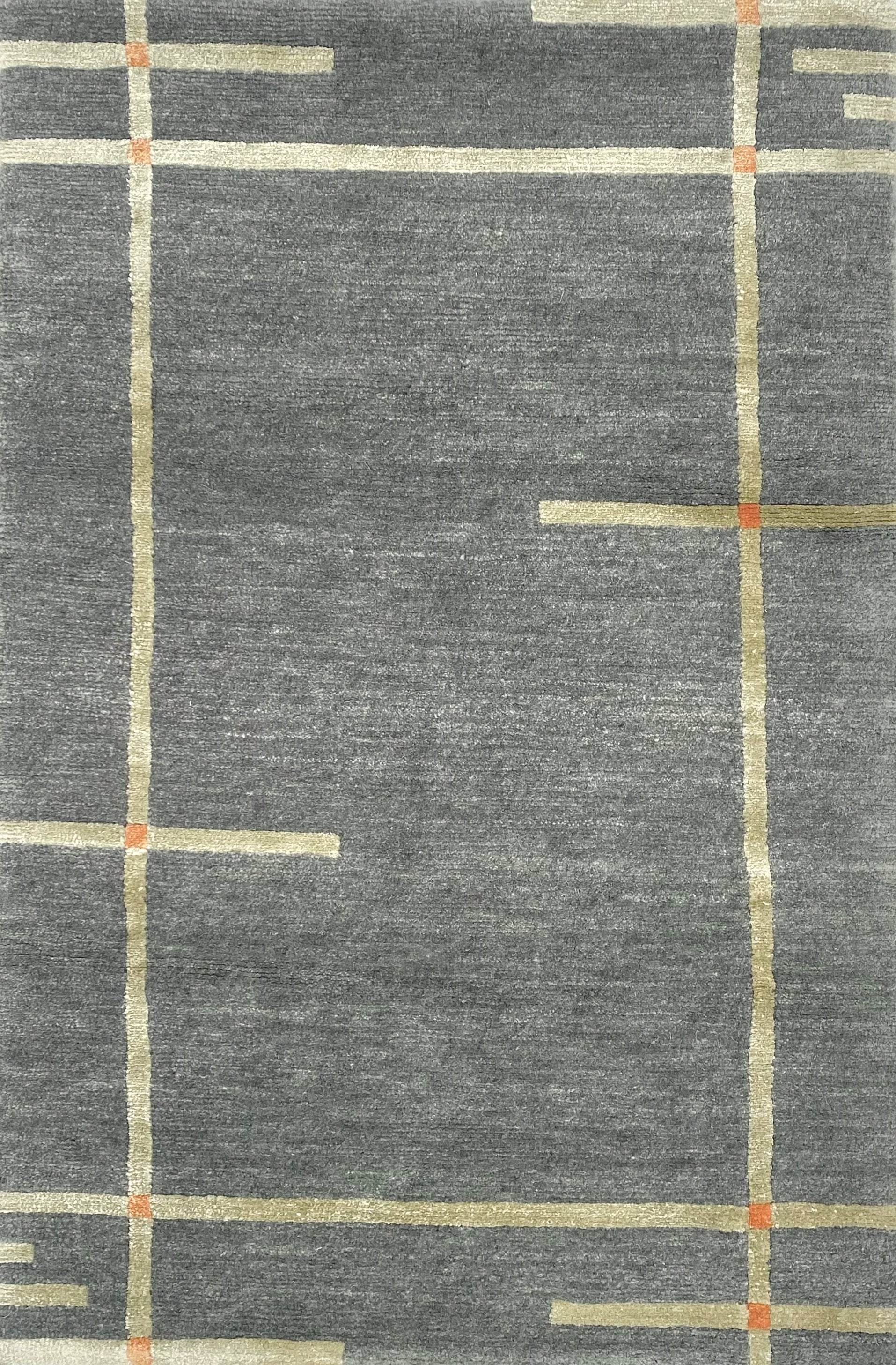 Handknotted carpet in a contempoary linear design in taupe with orange accents on a grey field. 
