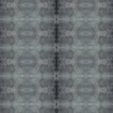 Detail of wallpaper in a repeating ink blot print in shades of gray.