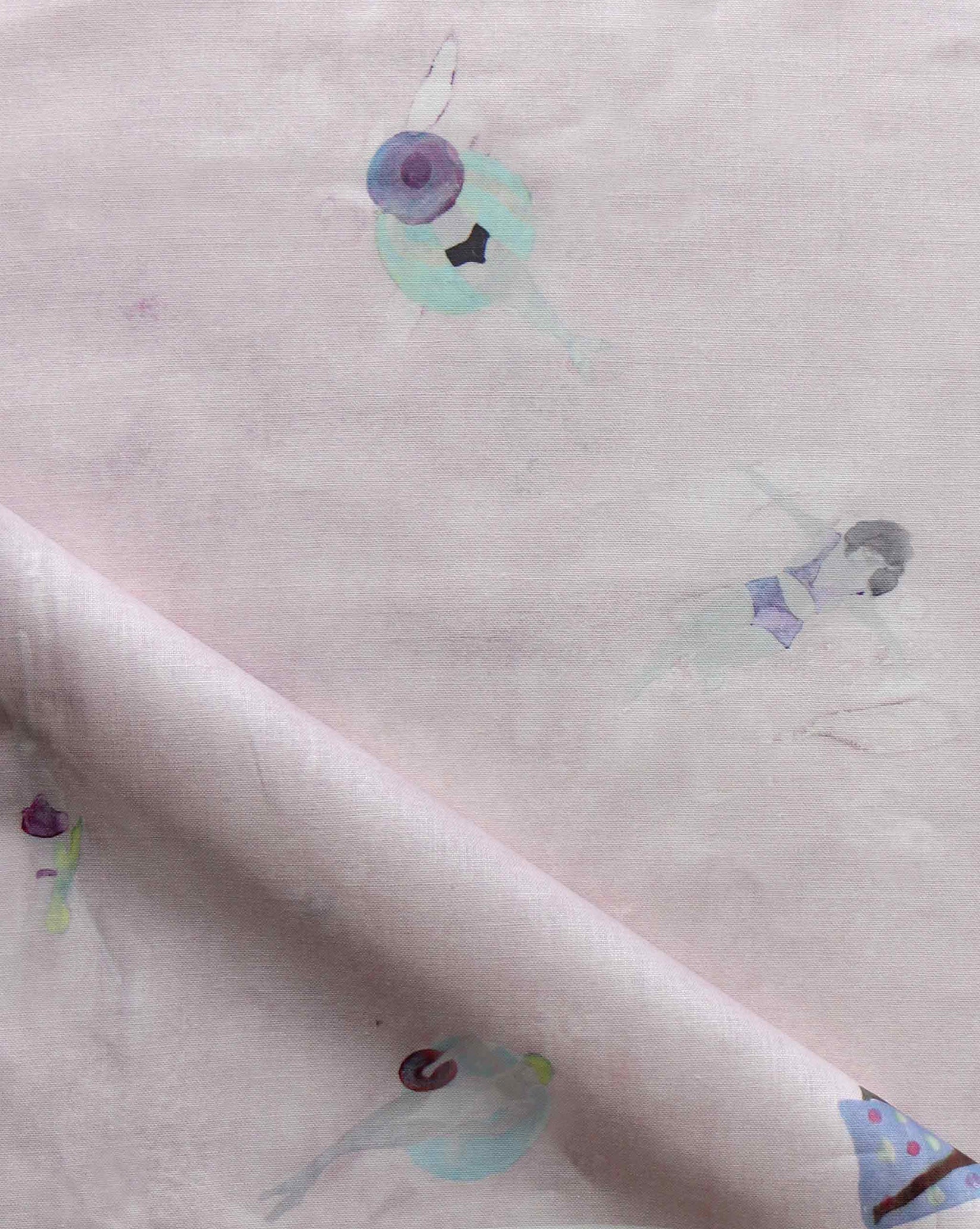 Fabric with watercolor characters swimming on a light pink background