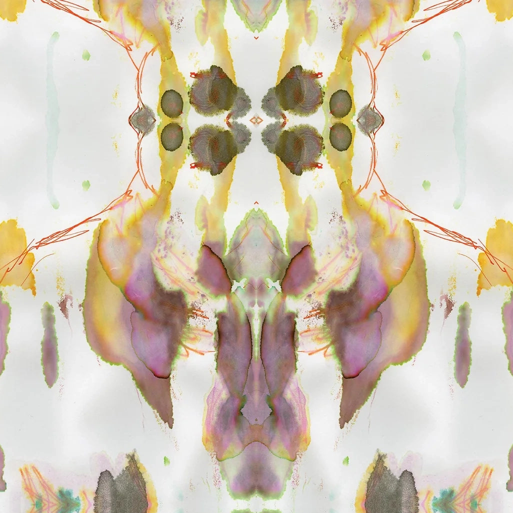 Detail of wallpaper in a watercolor paint blotch print in shades of gray, yellow and pink on a white field.