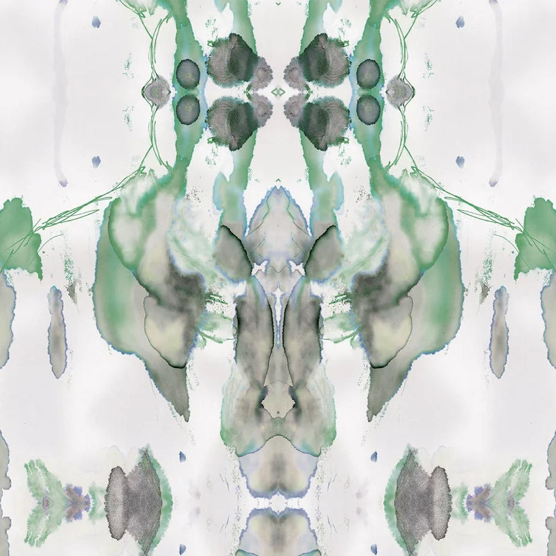 Detail of wallpaper in a watercolor paint blotch print in shades of gray and green on a white field.
