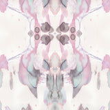 Detail of wallpaper in a watercolor paint blotch print in shades of gray and pink on a white field.