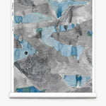 Roll of wallpaper with abstract watercolor design in shades of grey and blue.