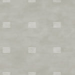 Detail of wallpaper in a gridded dash print in white on a sage field.