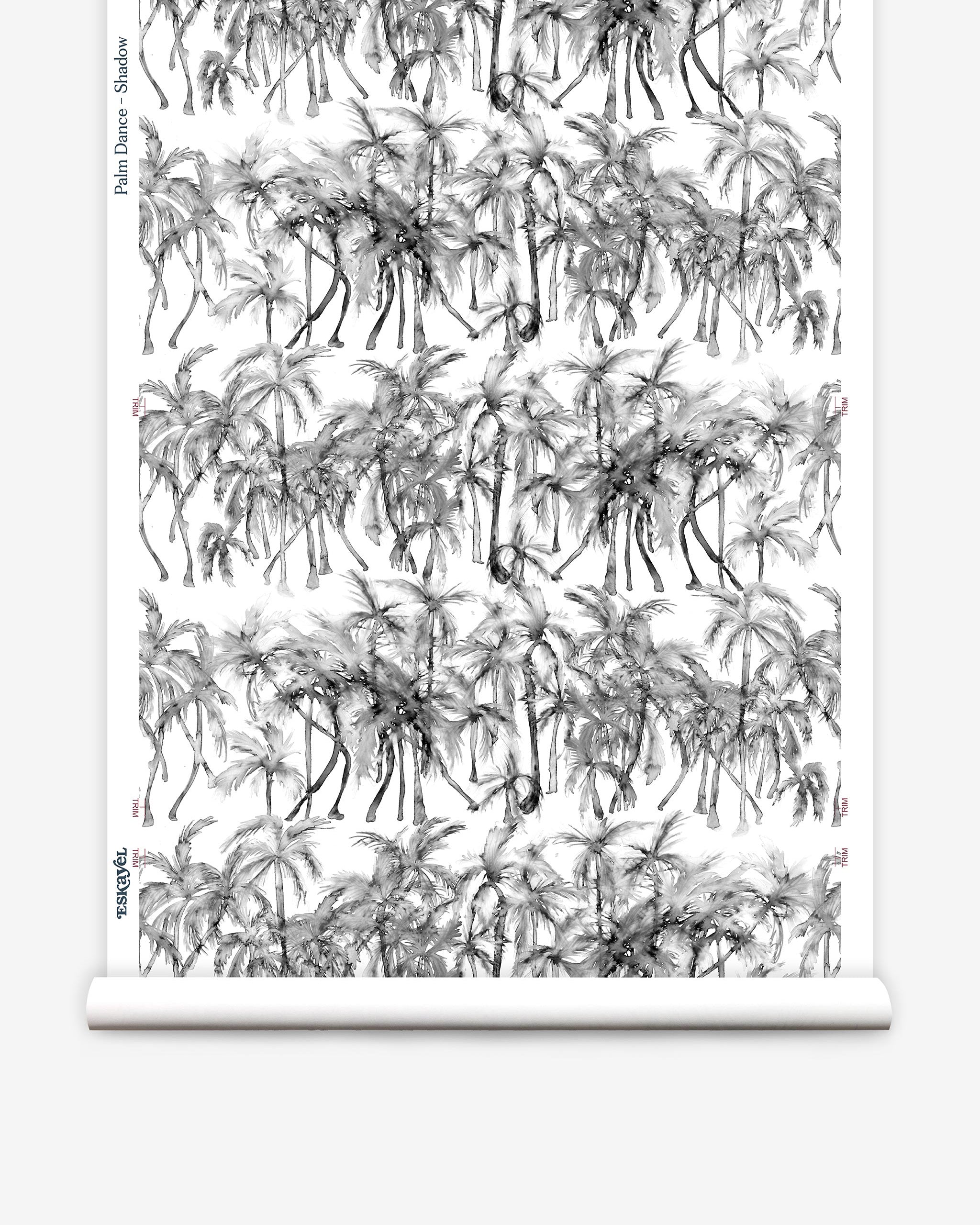Partially unrolled wallpaper yardage in a painterly palm tree stripe print in gray and white.