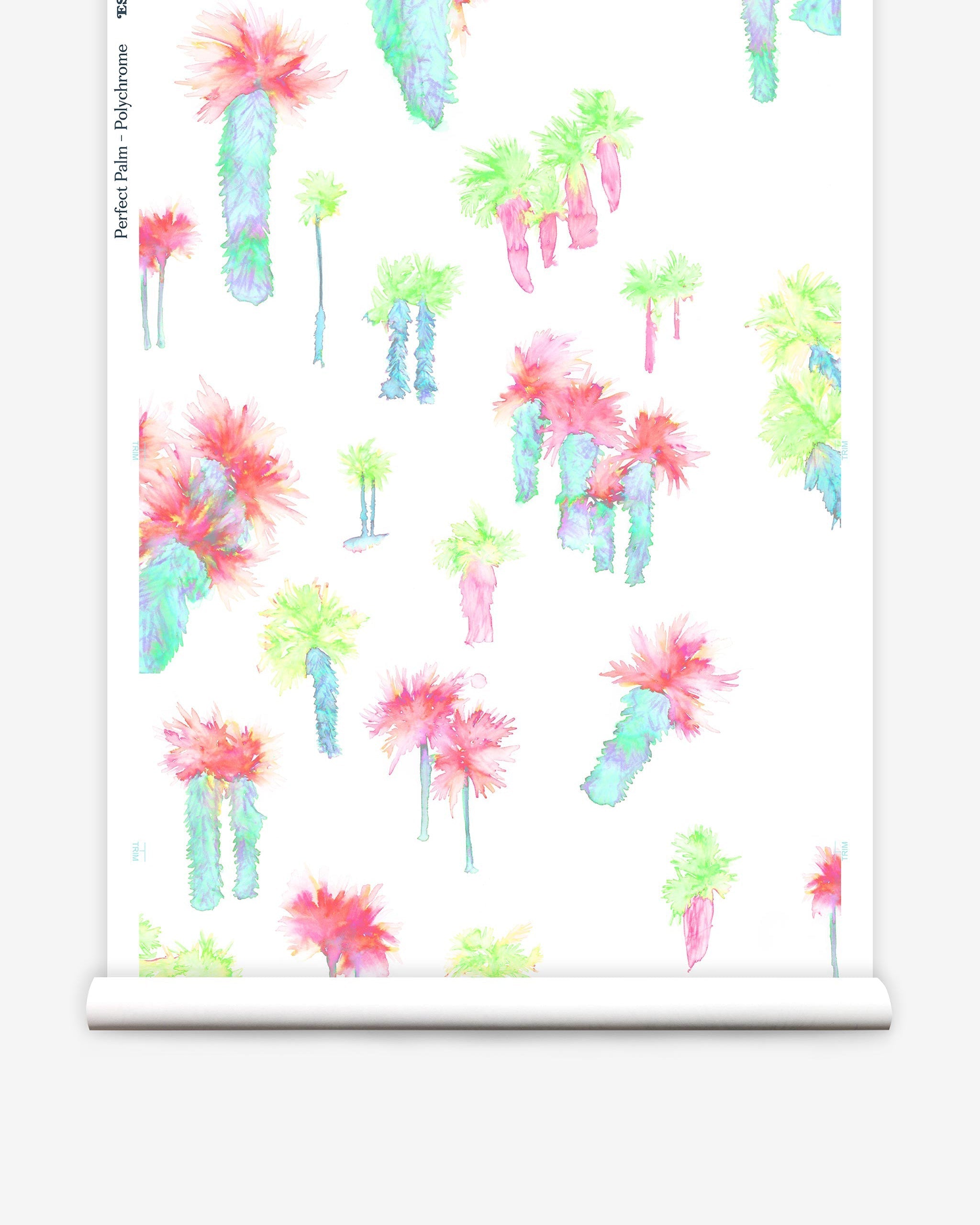 Partially unrolled wallpaper yardage in a playful palm tree print in a rainbow of neon shades on a white field.