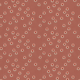 Scaled-out view of wallpaper in a minimal floral print in shades of pink, red and blue on a maroon field.