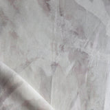 Close-up of a textured fabric with a subtle pattern