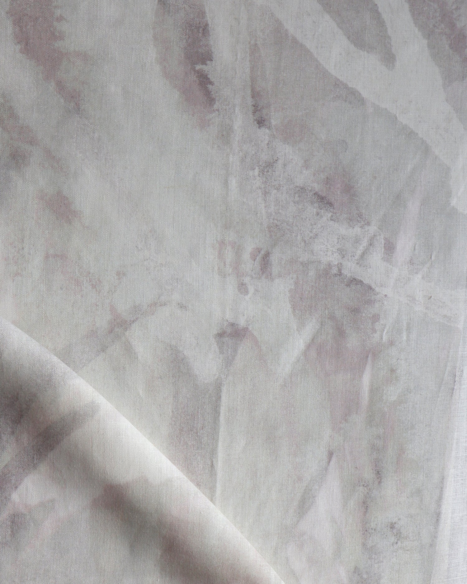 Close-up of a textured fabric with a subtle pattern