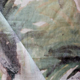 Abstract art with a mix of green, black, and white colors.