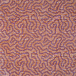 Printed fabric in a meandering hand drawn line pattern in purple on an orange field. 