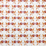 Printed linen in a small scale watercolor floral in orange and purple.