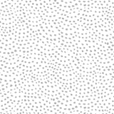 Detail of wallpaper in a scalloped dot print in gray on a cream field.