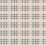 Detail of fabric in a squiggly check pattern in pink, blue and brown on a light blue field.