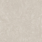 Detail of wallpaper in a playful abstract sun print in white on a cream field.
