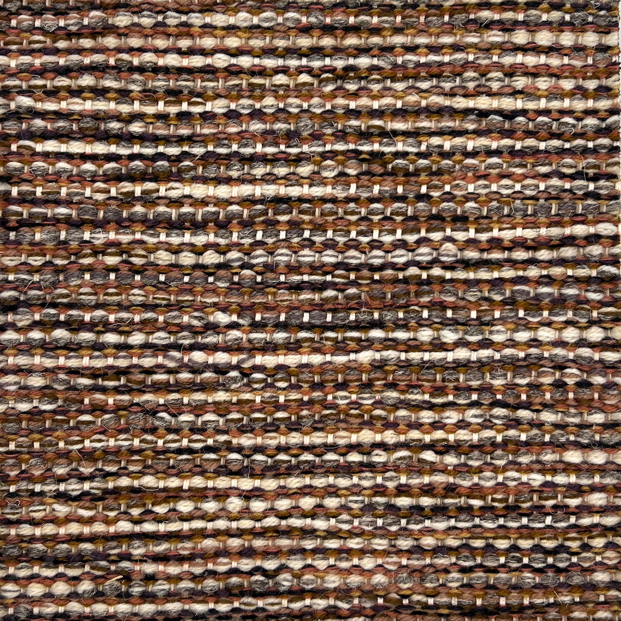 Textural flatweave rug in a heathered brown and cream design.