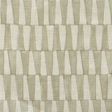 Close-up of fabric in a playful triangular stripe print in gray and cream.