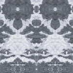 Detail of wallpaper in a painterly ikat print in shades of gray and light blue.