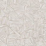 Detail of wallpaper in an abstract linear print in white on a cream field.