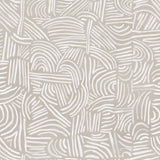Detail of wallpaper in an abstract linear print in white on a cream field.