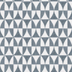 Detail of fabric in a curvilinear grid print in navy on a white field.
