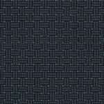 Embroidered fabric in a dashed basketweave design in navy blue with green accents.